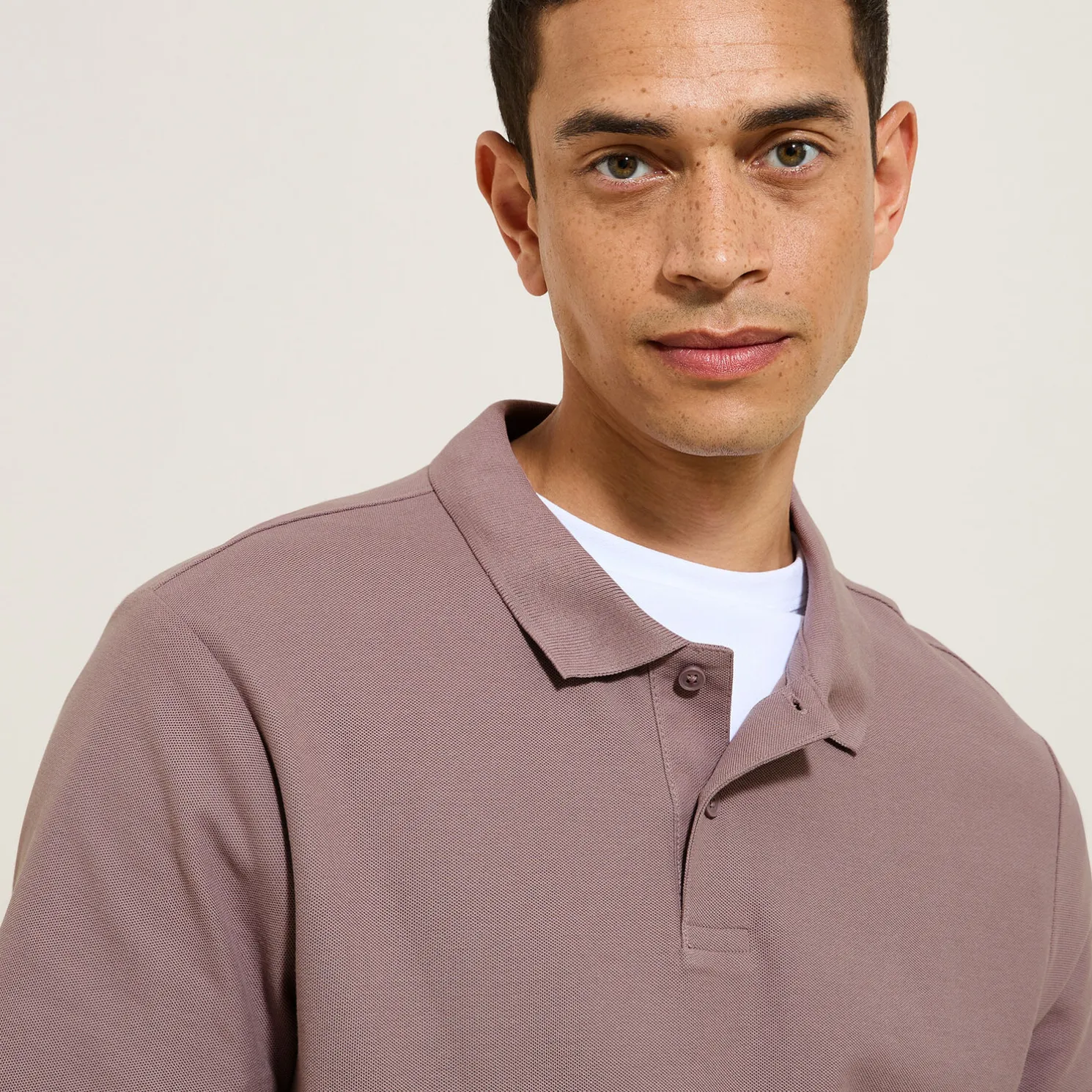 Effen polo in piquékatoen met korte mouwen