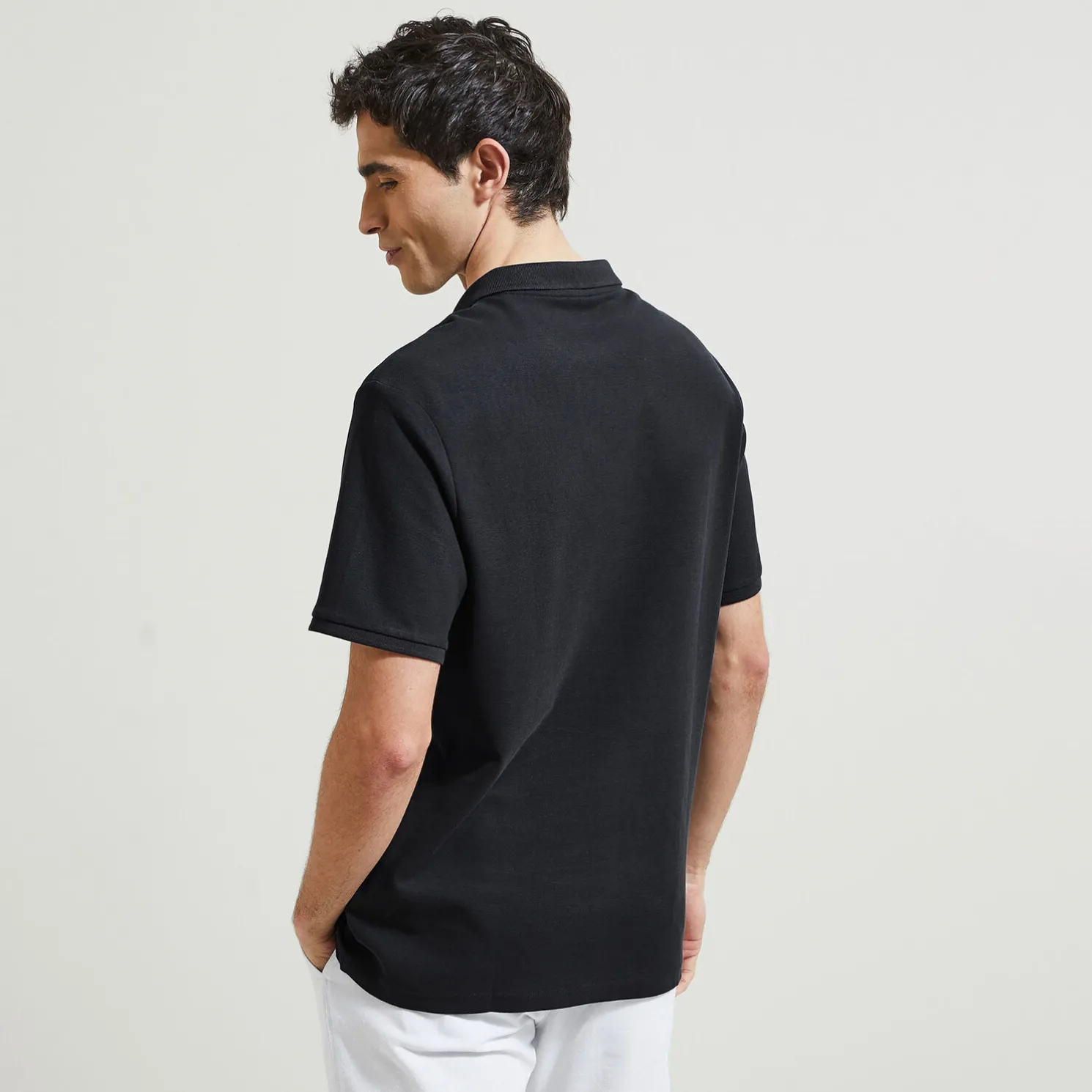 Effen polo in piquékatoen met korte mouwen