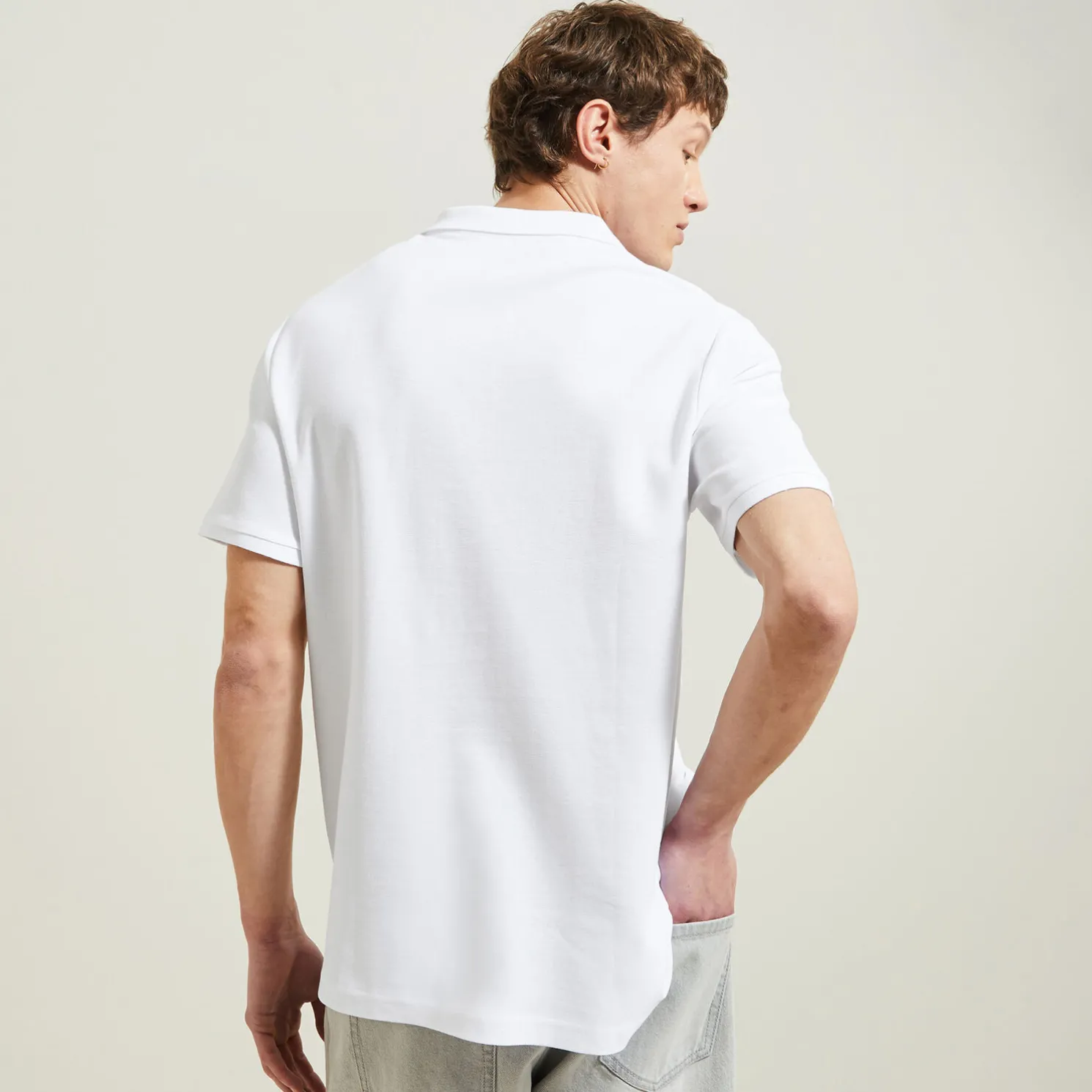 Effen polo in piquékatoen met korte mouwen