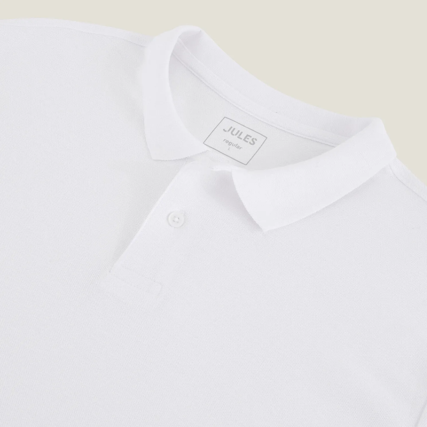 Effen polo in piquékatoen met korte mouwen