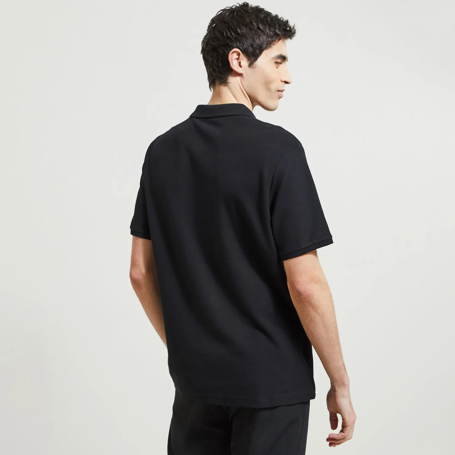 Effen polo in piquékatoen met korte mouwen