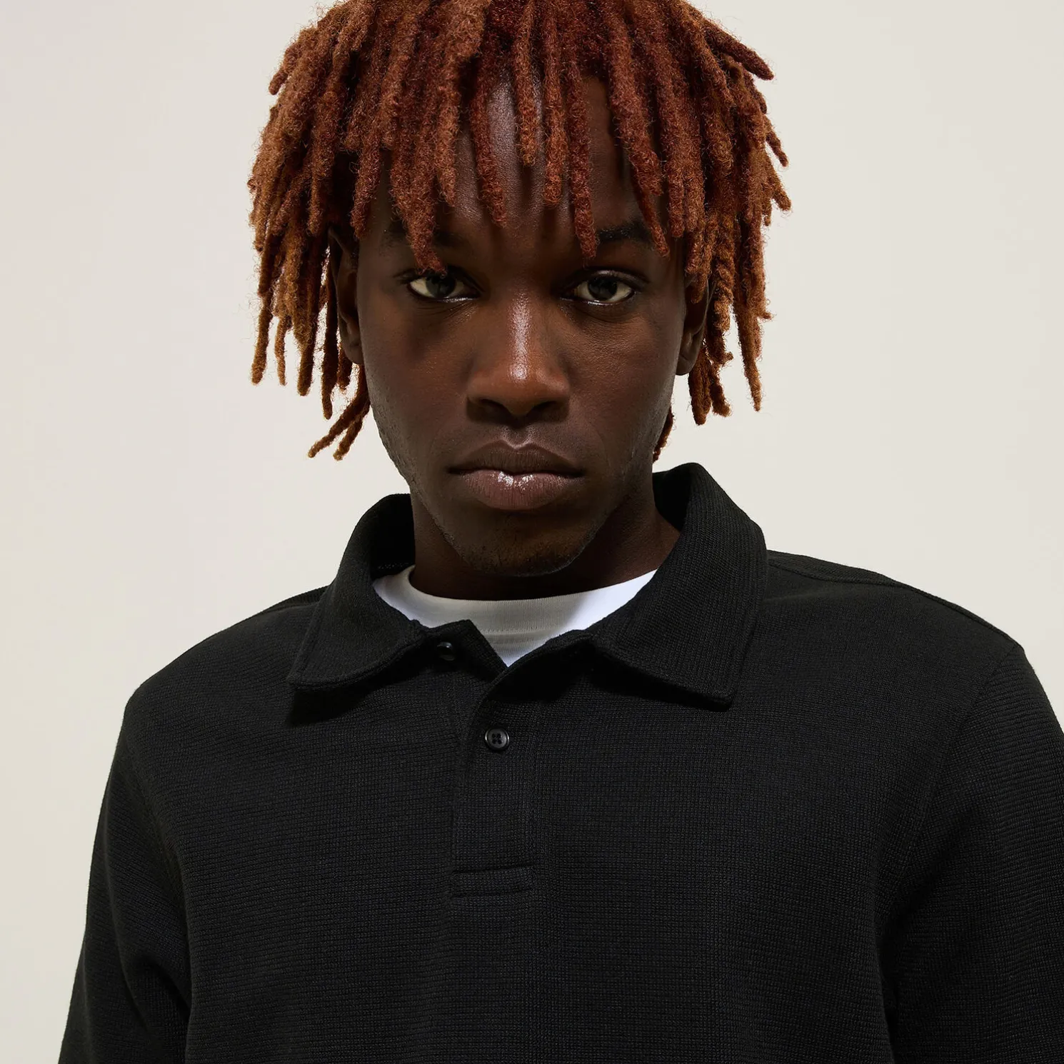 Effen relaxed polo met korte mouwen in textuurstof