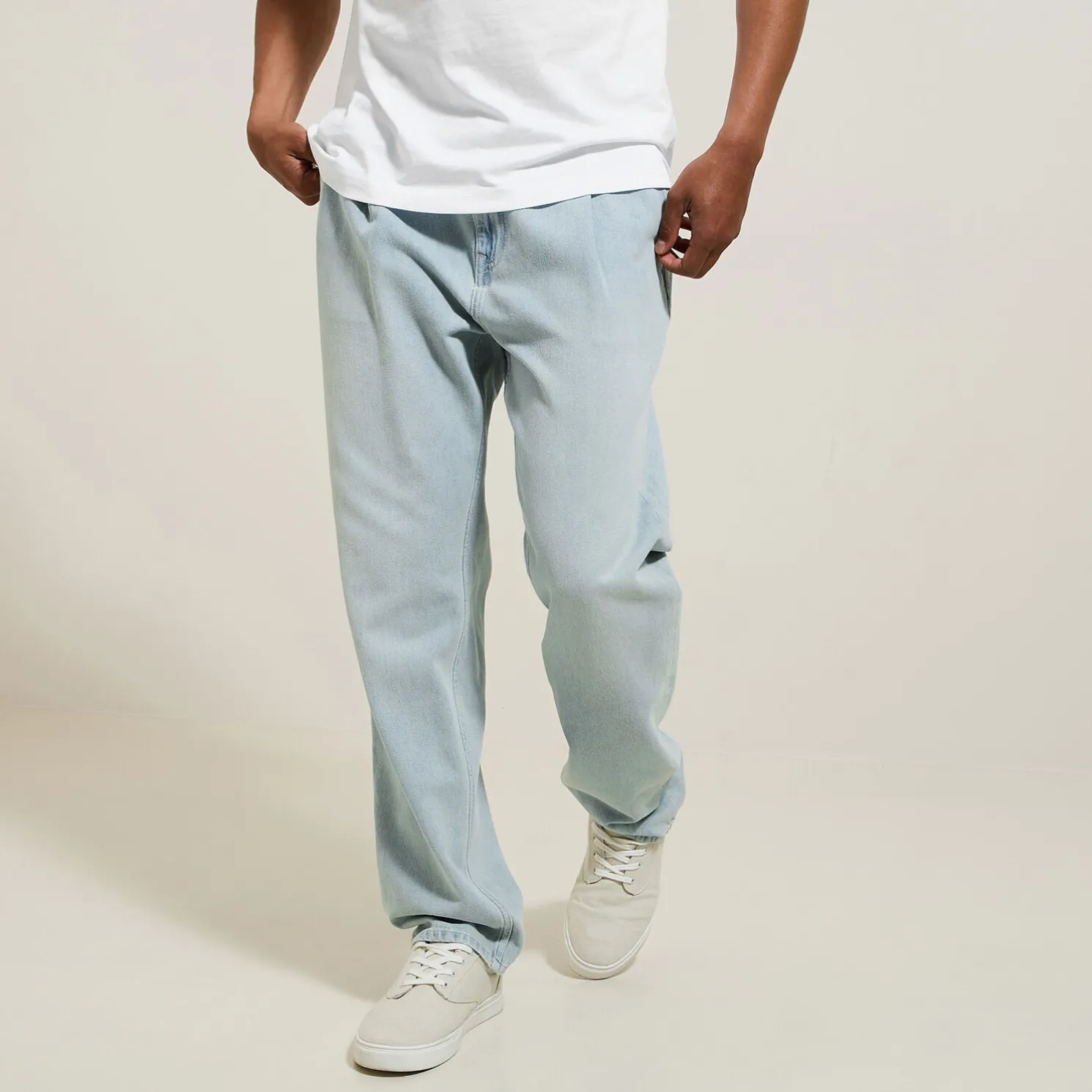 Loose jeans met plooien