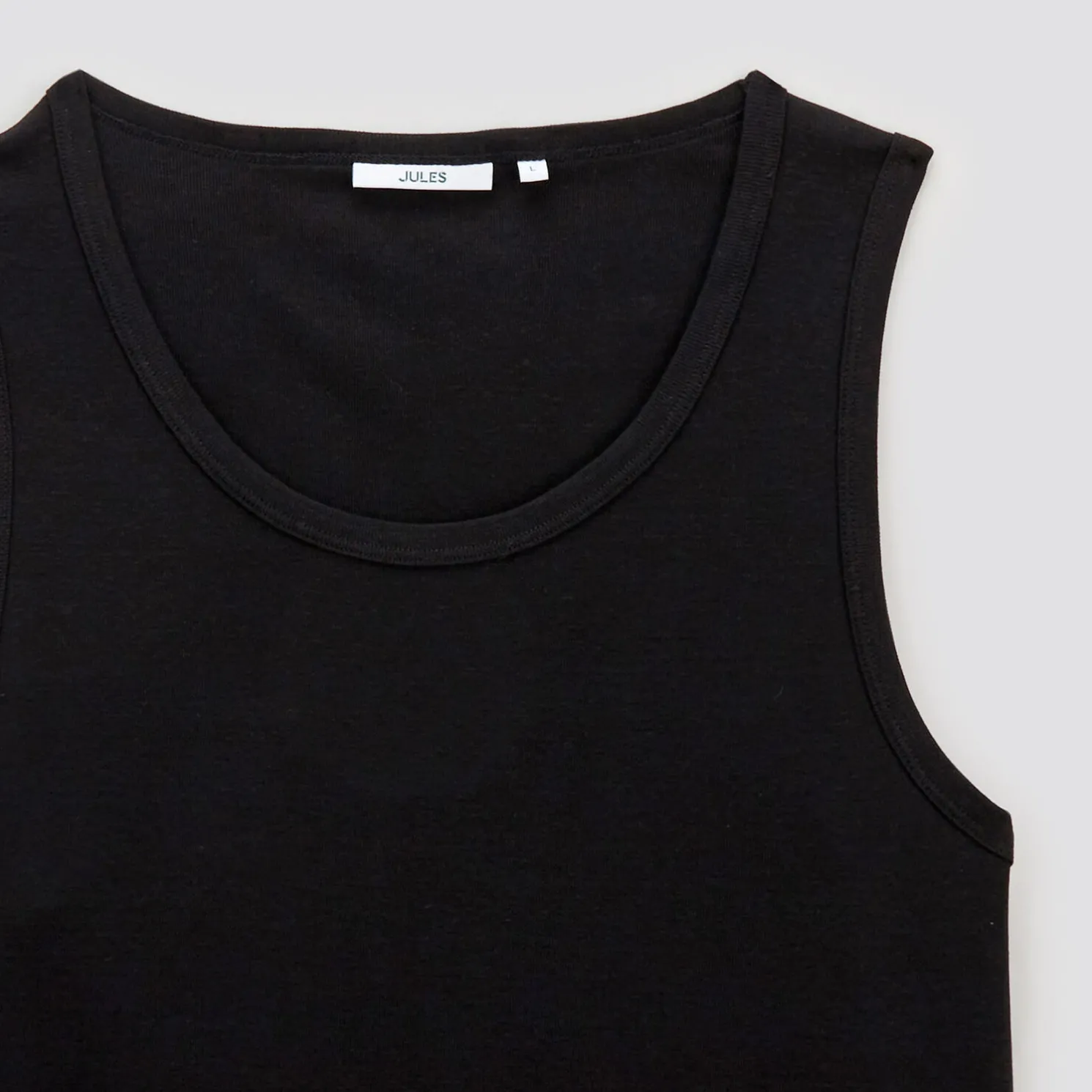 Mouwloos hemdje in 1x1 ribboord