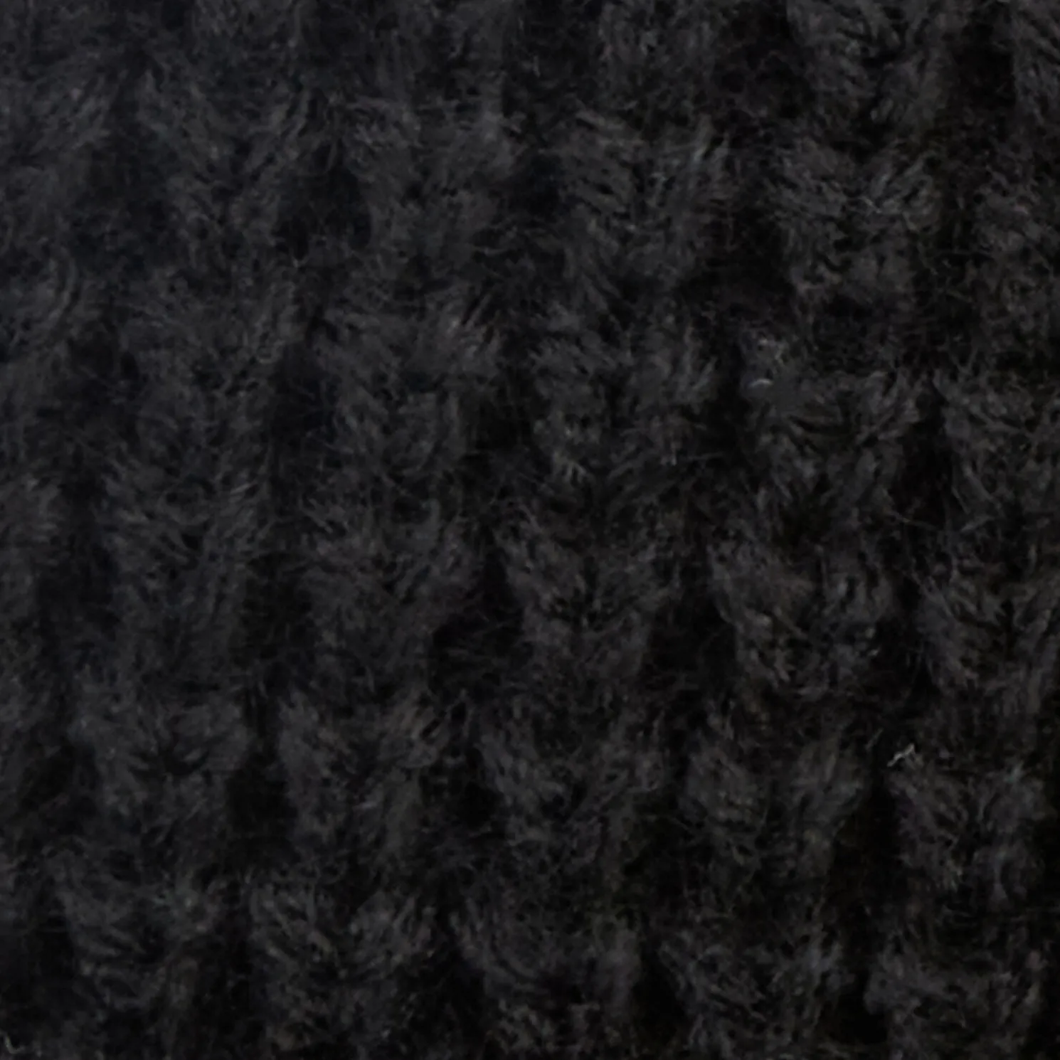 Muts in tricot met fleecebinnenkant