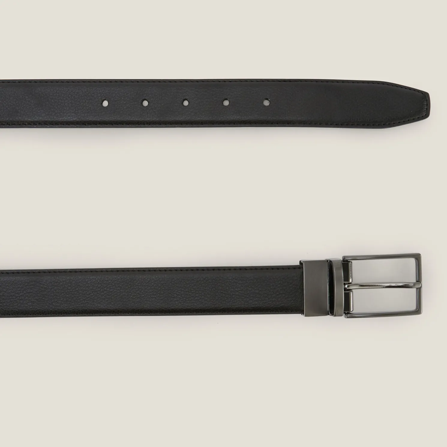 Omkeerbare riem met rolgesp