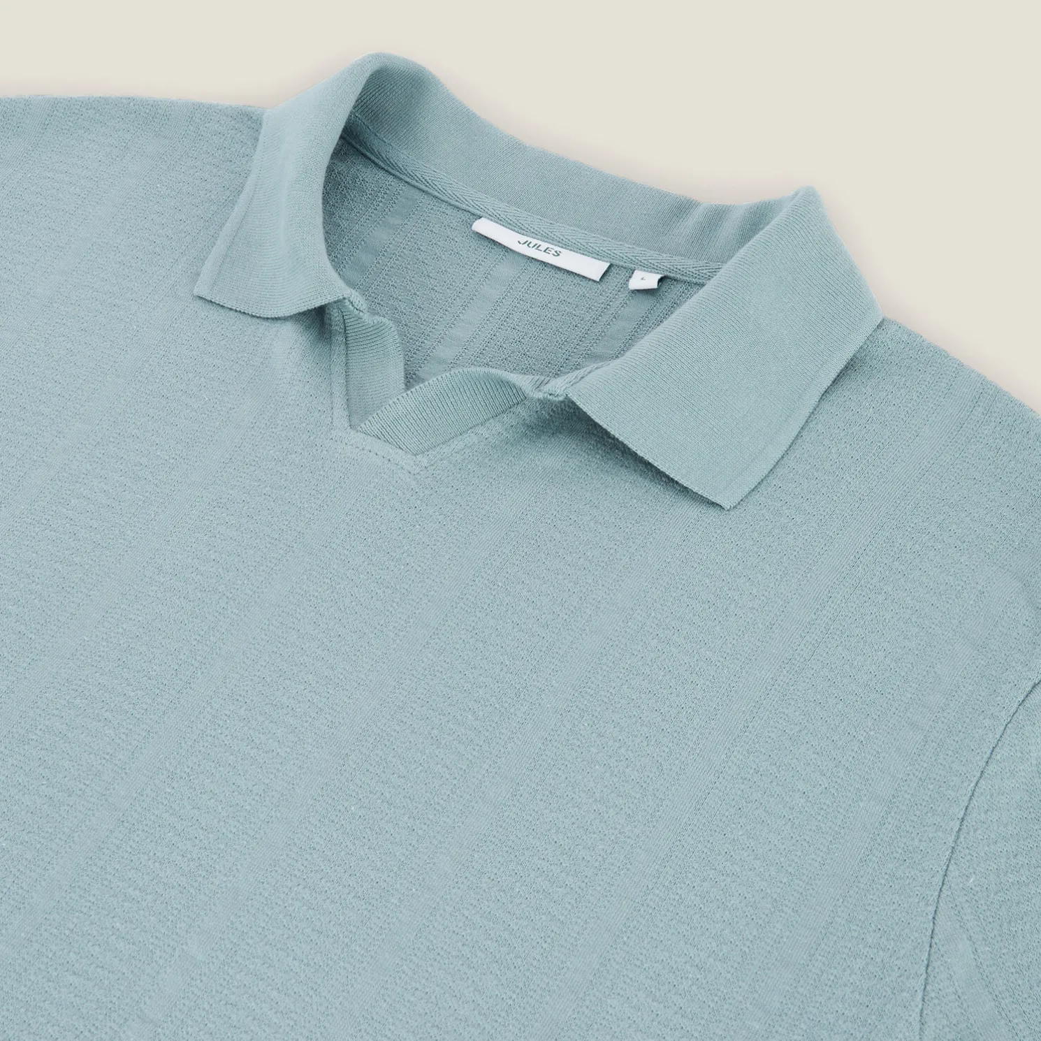 Polo in textuurstof met korte mouwen en resortkraa