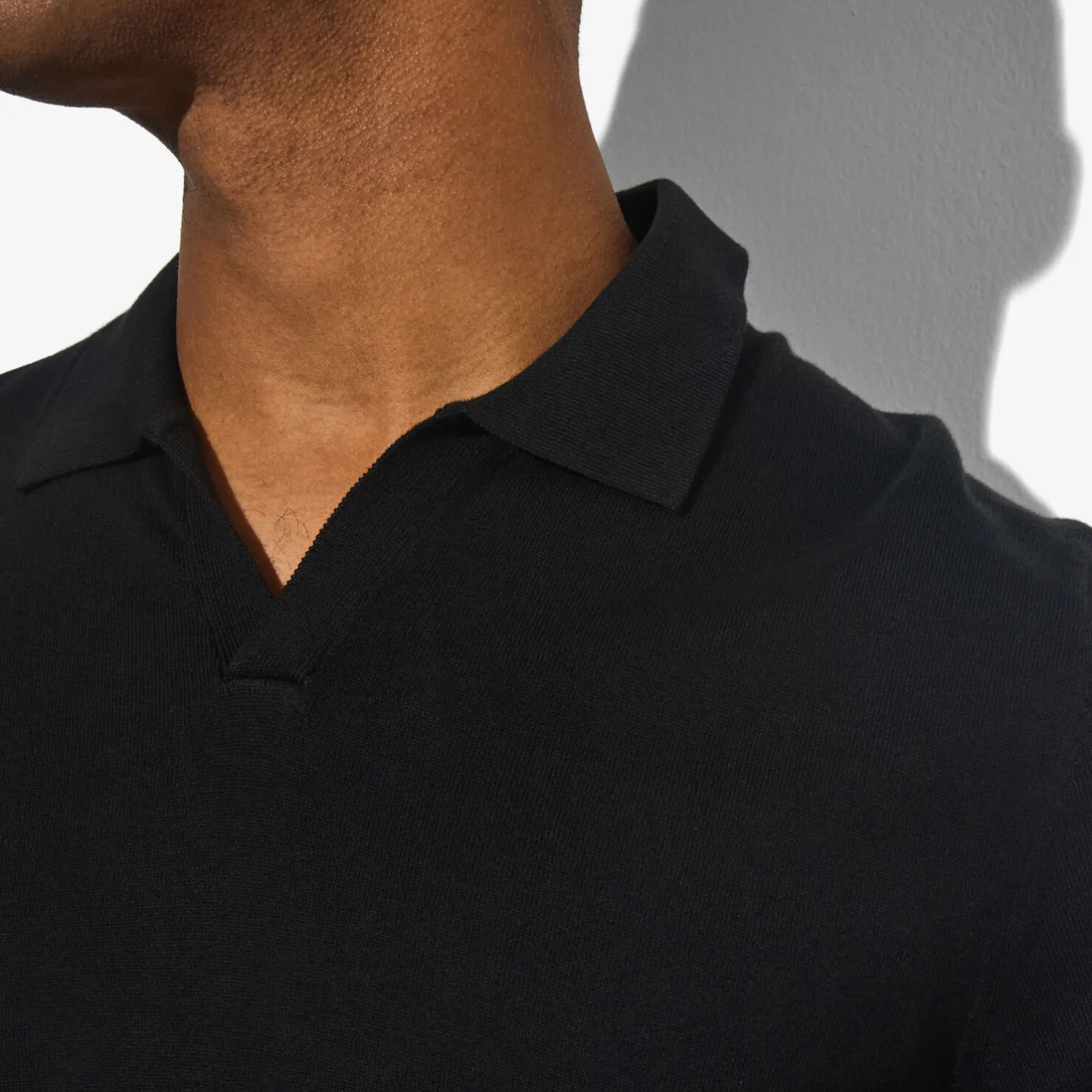 Polo in tricot met resortkraag