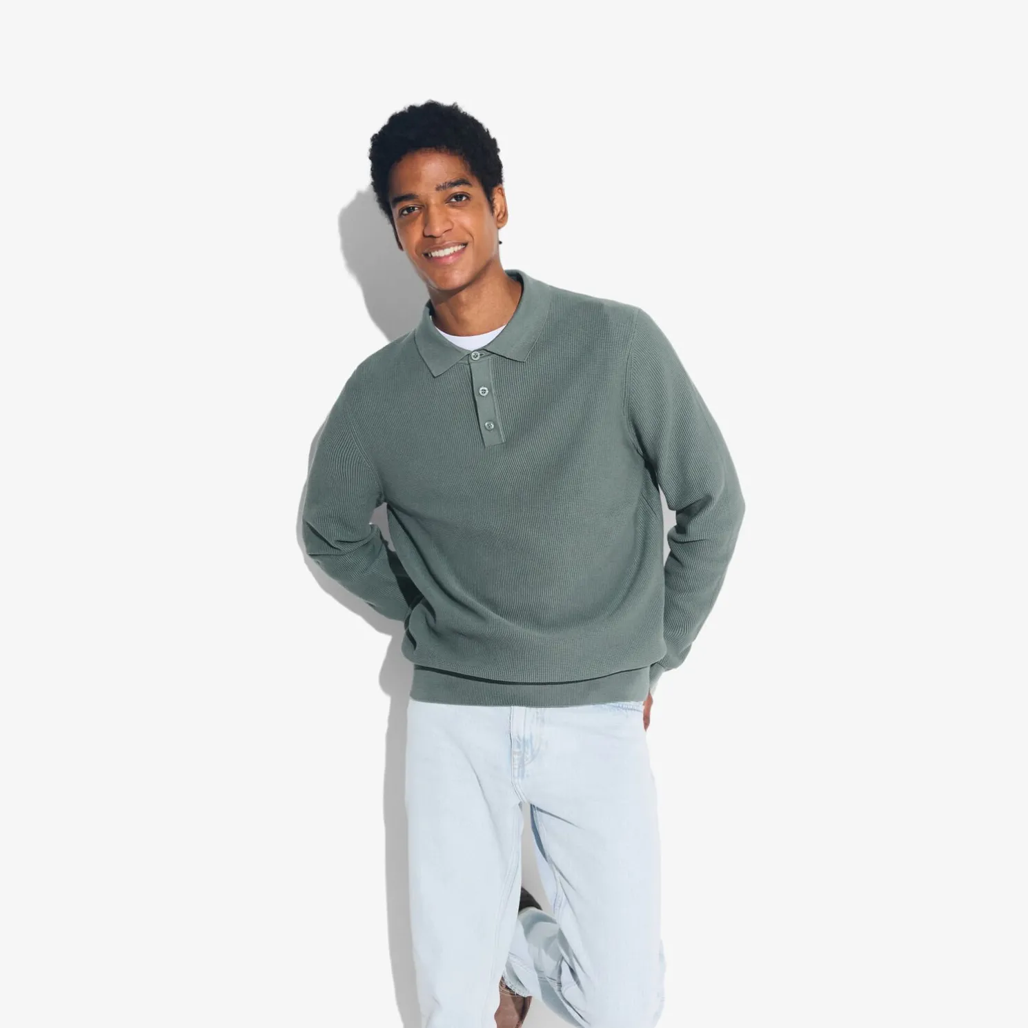 Polo met knopen in textuurstof