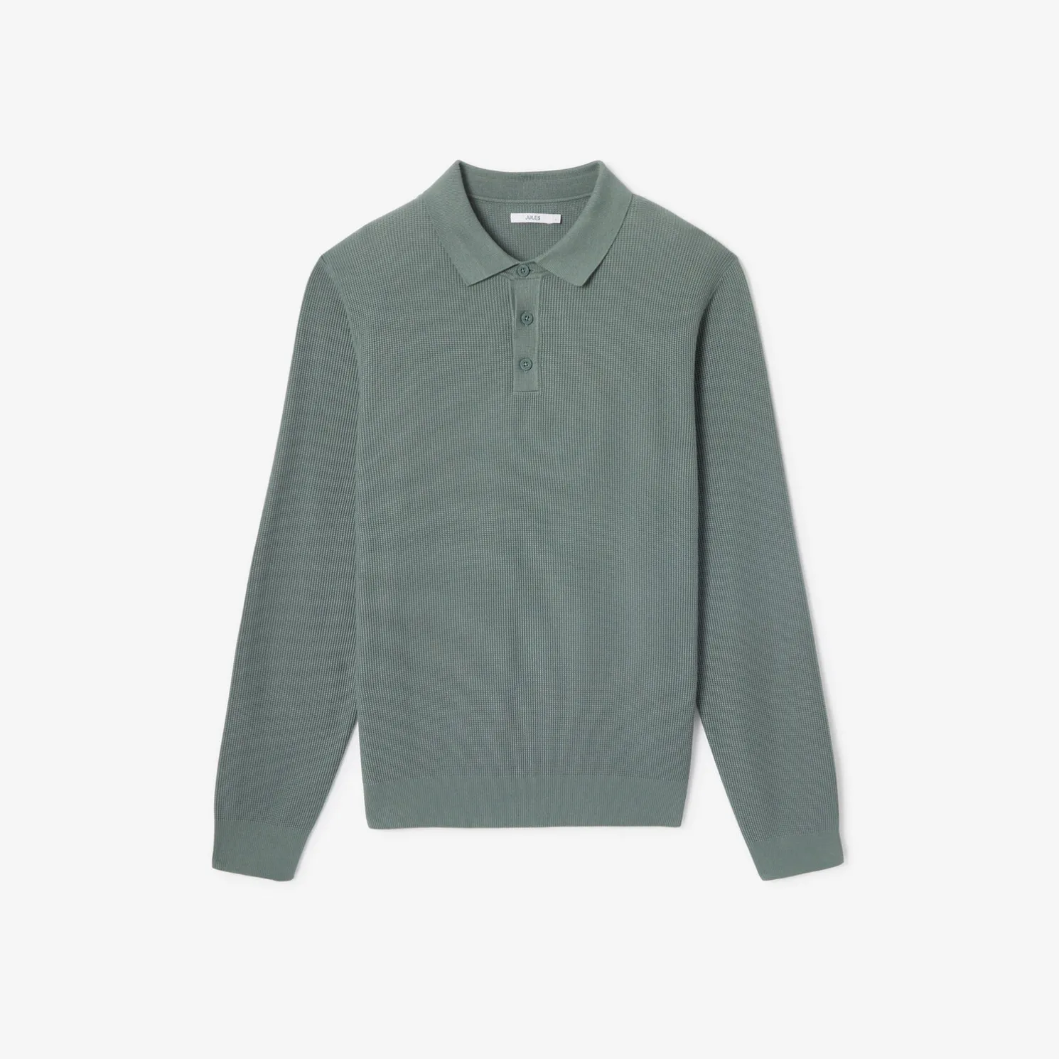 Polo met knopen in textuurstof