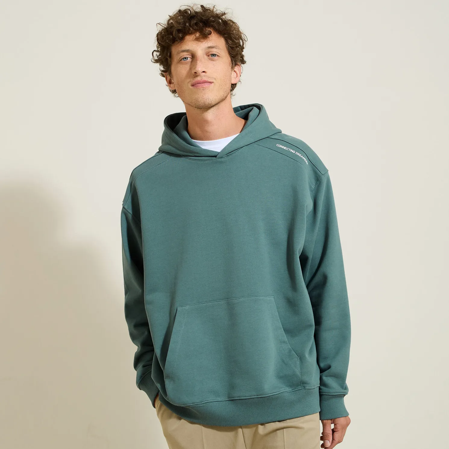 Sweater met kap, oversize snit en print op de kap