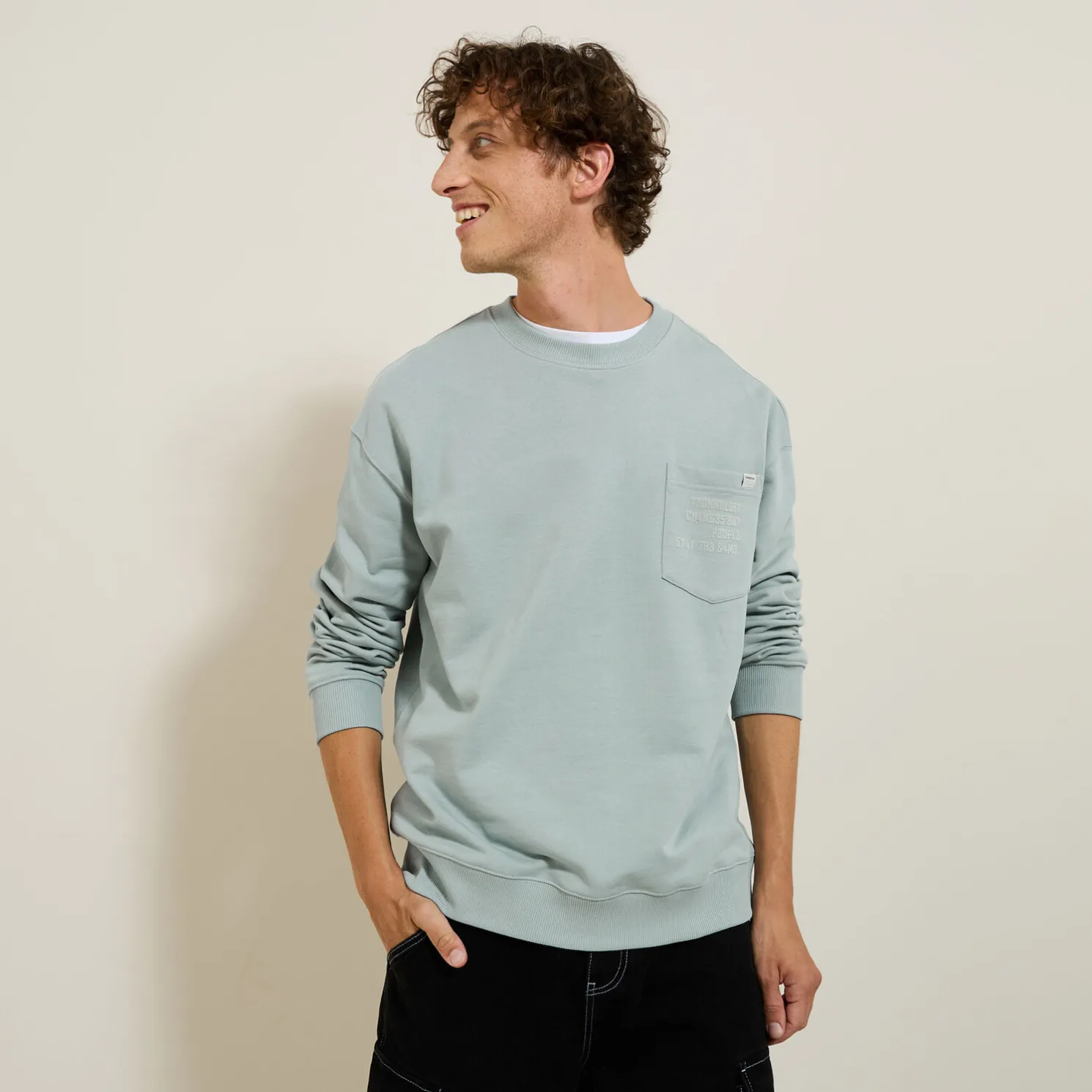 Sweater ronde hals, zak en afbeelding