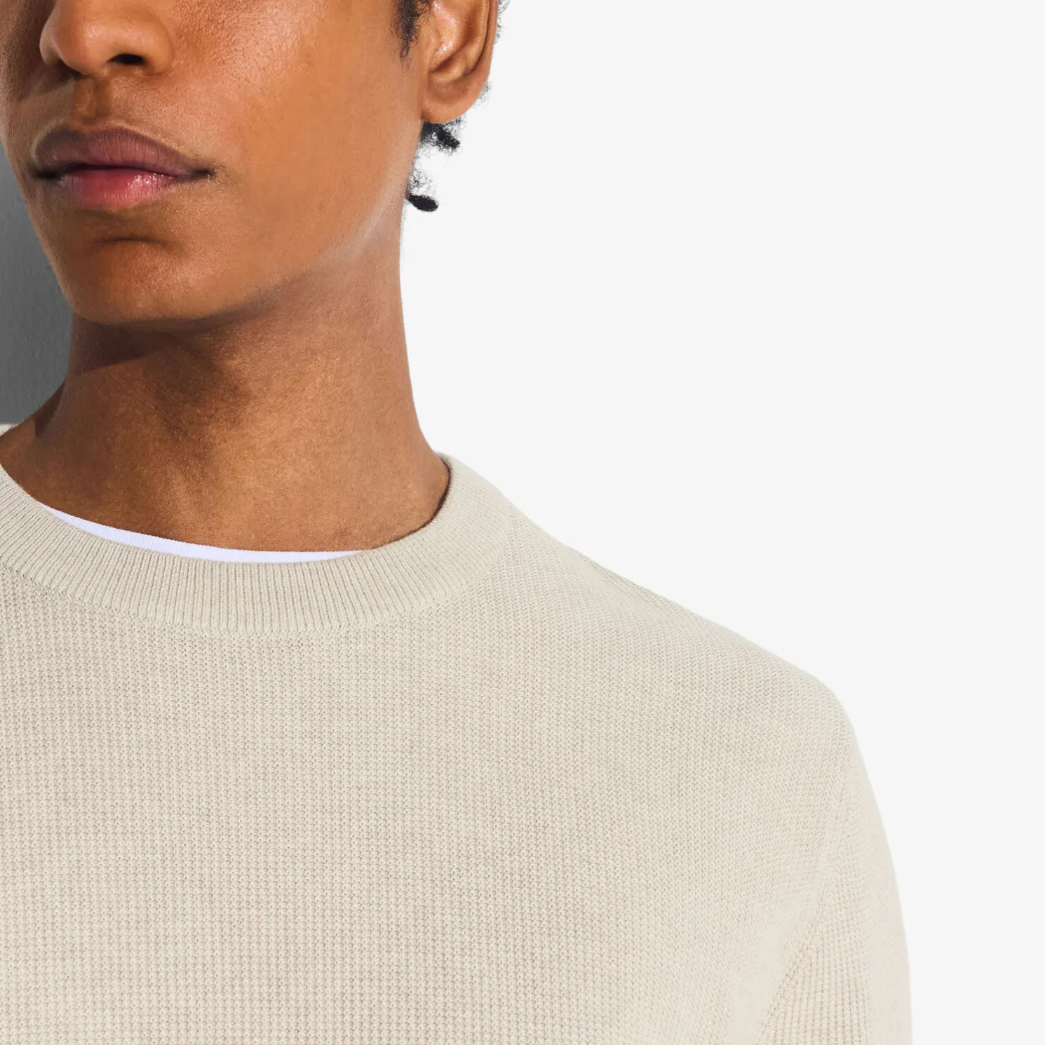 Trui met ronde hals en stekenpatroon