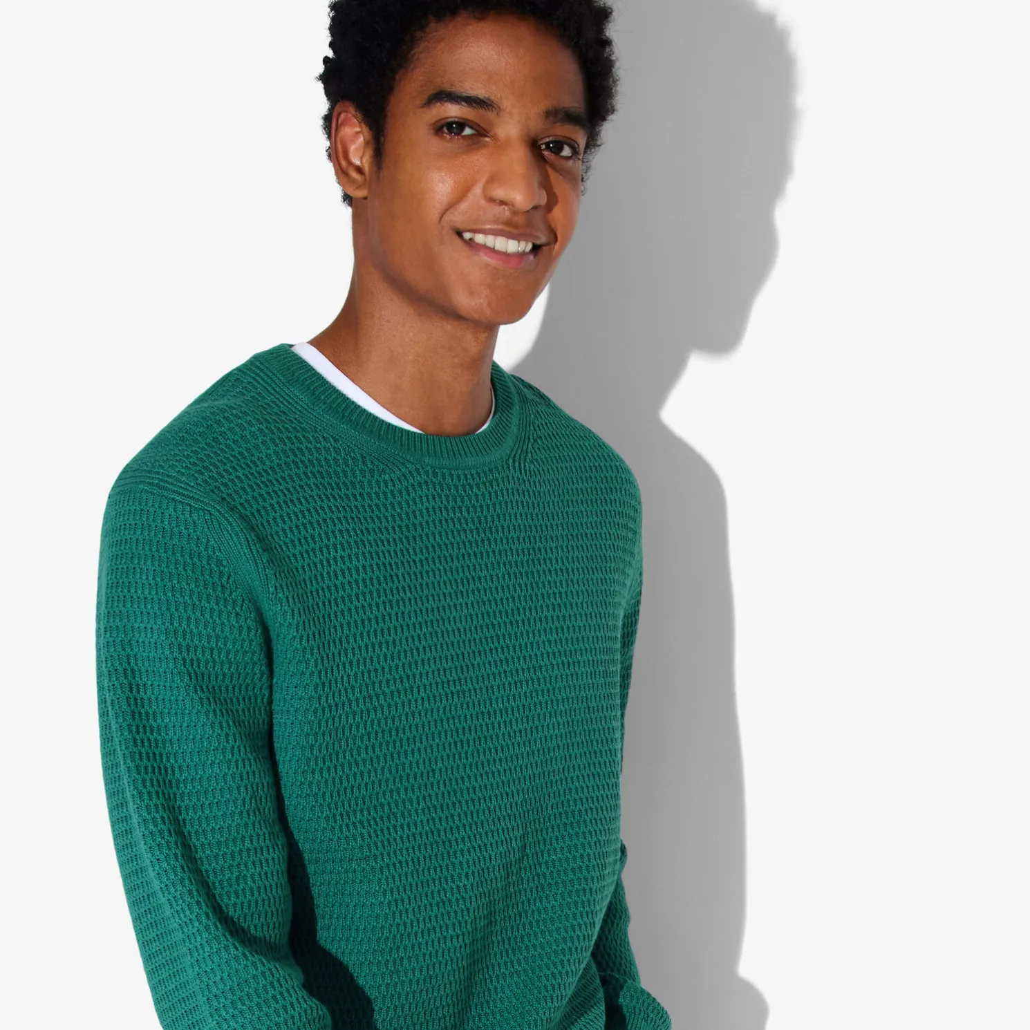 Trui met ronde hals en reliëfsteken