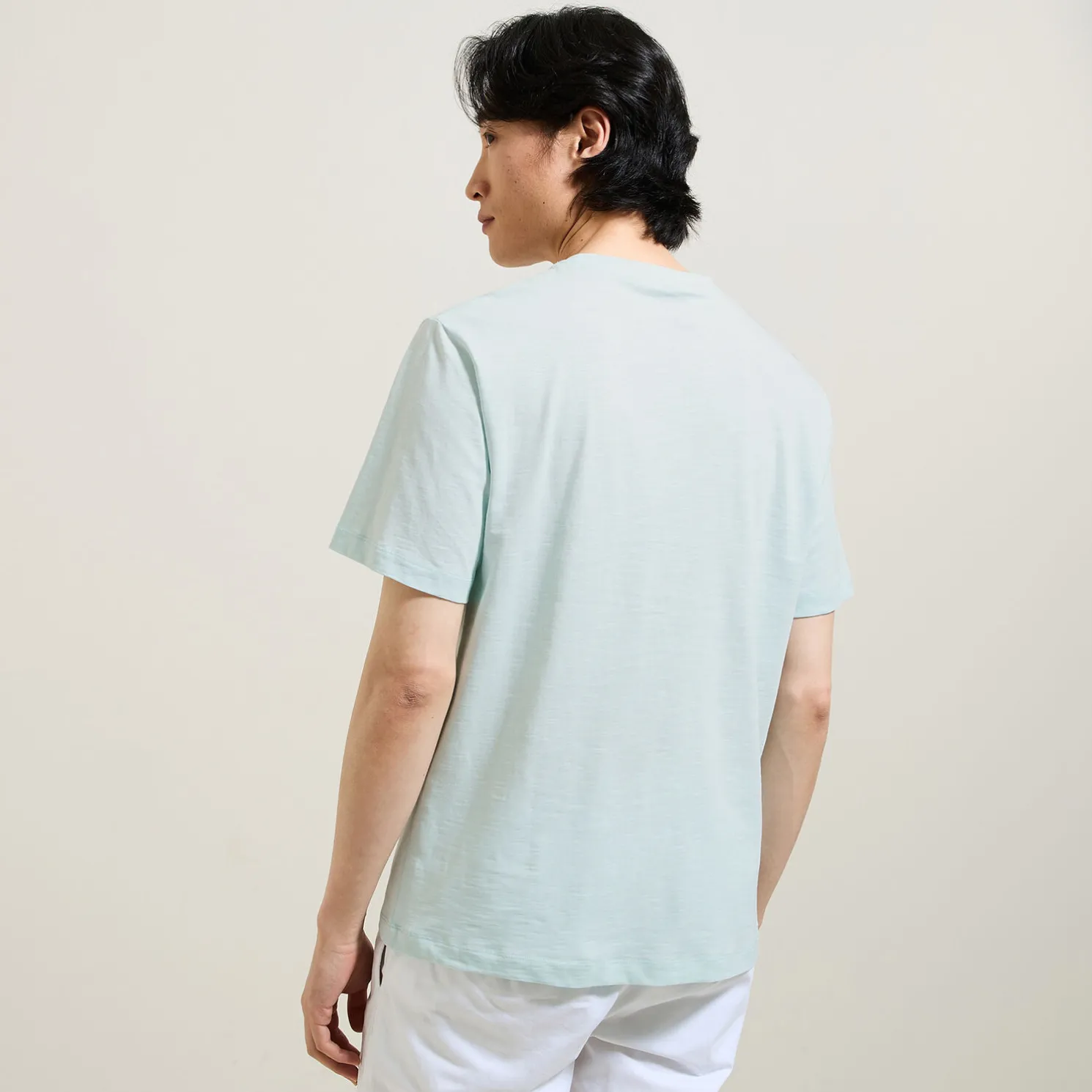 T-shirt in gevlamde stof met borduursel op de bors